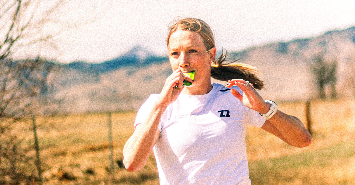 What is the best way to balance training reduction and carbohydrate increase during tapering?